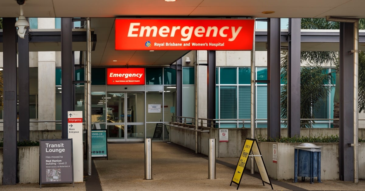 A hospital emergency room entrance, with automatic sliding doors.