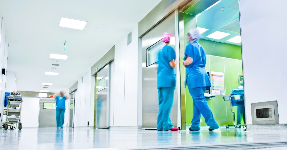Image depicting automatic doors in a medical facility.