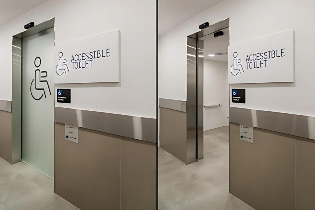 STA21 automatic sliding doors gallery 1 Accessible toilet with RECORD automatic sliding door shown in closed and open positions.